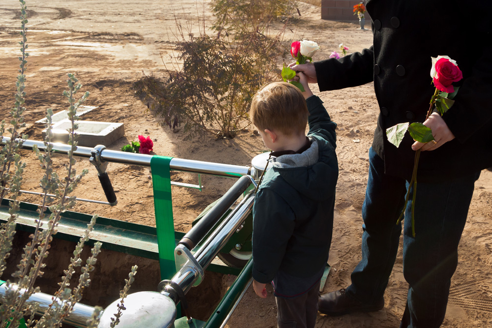 Father-and-son-say-goodbye-to-a-loved-one