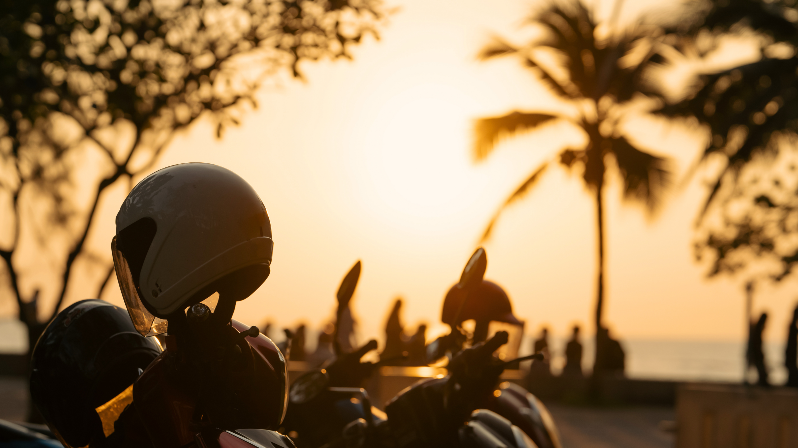 Motorcyclist riding without a helmet on a Florida road